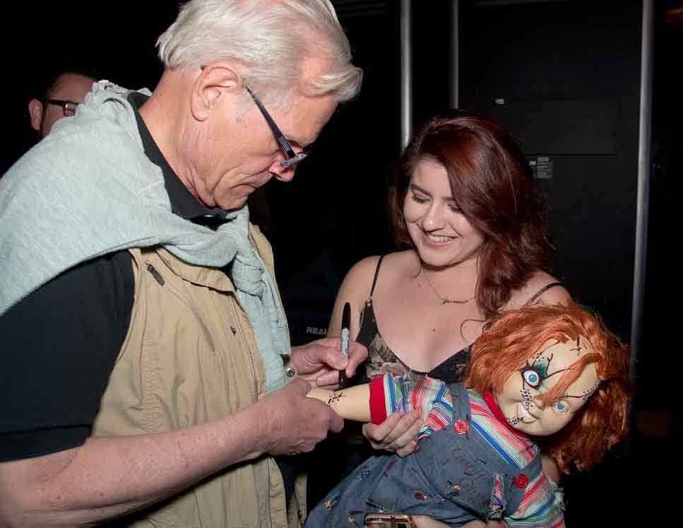 Tom Holland signs Chucky doll